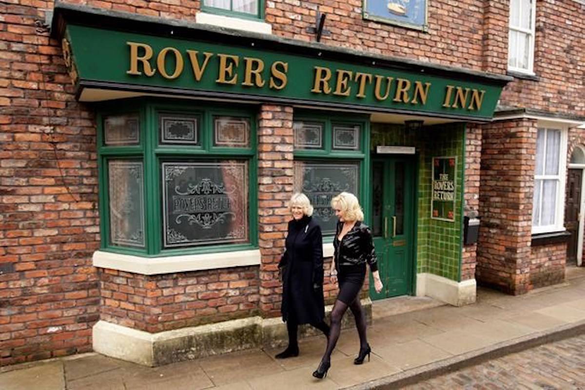 The Duchess of Cornwall, left, is accompanied by actress Beverley Callard outside the Rovers Return pub during her visit to the set of the British TV series Coronation Street, in Manchester, England, Thursday Feb. 4, 2010. Shannon Leonard Churchill left the world with a single regret: not knowing how Coronation Street will end. THE CANADIAN PRESS/AP-Jon Super