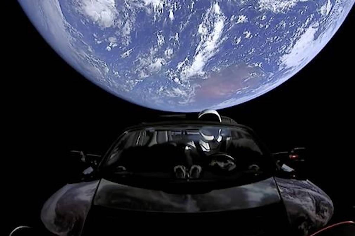 This image from video provided by SpaceX shows the company’s spacesuit in Elon Musk’s red Tesla sports car which was launched into space during the first test flight of the Falcon Heavy rocket on Tuesday, Feb. 6, 2018. (SpaceX via AP)