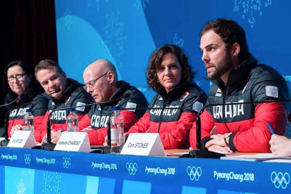 COC president Tricia Smith, CEO Chris Overholt, executive director Eric Myles, and Chef de Mission Isabelle Charest, left to right, listen to bobsledder Cam Stones, right, during a news conference at the Pyeongchang Winter Olympic Games, in Pyeongchang, South Korea, Thursday, February 8, 2018. (Paul Chiasson/The Canadian Press)
