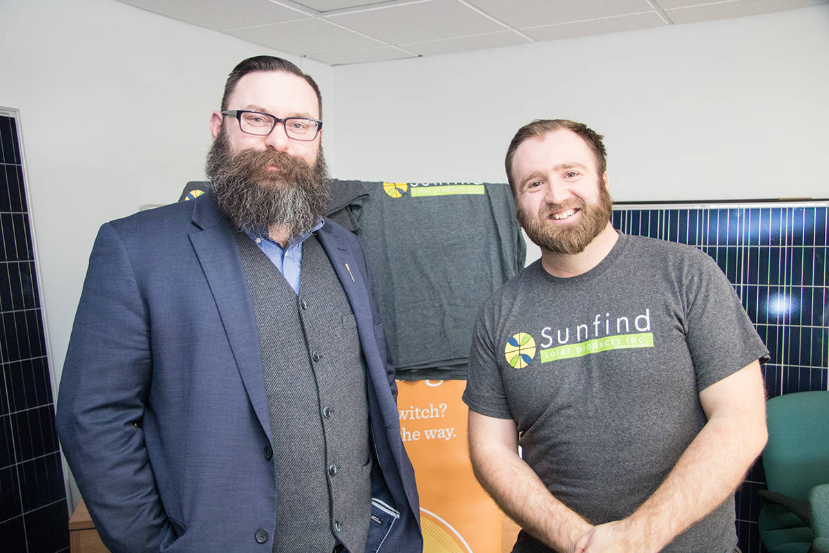 LET’S TALK BUSINESS - Minister of Municipal Affairs Shaye Anderson (left) was in Red Deer to meet with local businesses and public officials. Caleb Schmidt of Sunfind Solar Products was one of the local businesses to meet with the Minister. Todd Colin Vaughan/Red Deer Express