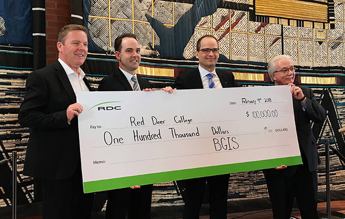 TEAMWORK - From left, Joel Ward, Roger Billings, Mike Greidanus and Michael Donlevy at Red Deer College’s announcement of a donation of $100,000 from BGIS to the Shaping Our Future campaign. photo submitted