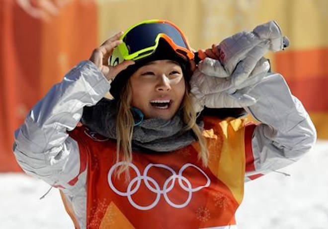 FILE - In this Tuesday, Feb. 13, 2018 file photo, Chloe Kim, of the United States, smiles during the women’s halfpipe finals at Phoenix Snow Park at the 2018 Winter Olympics in Pyeongchang, South Korea. A San Francisco Bay Area radio station has fired one of its hosts, Patrick Connor, after he made sexual comments about 17-year-old Olympic snowboarder Kim on another station. Program director Jeremiah Crowe of KNBR-AM, where Connor hosted “The Shower Hour,” confirmed the firing Wednesday, Feb. 14, 2018, for NBC Bay Area. (AP Photo/Lee Jin-man, File)