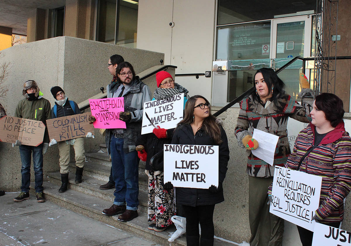 RALLYING FOR COLTEN - A group of Red Deerians gathered to rally for Colten Boushie outside of City Hall Monday. Carlie Connolly/Red Deer Express