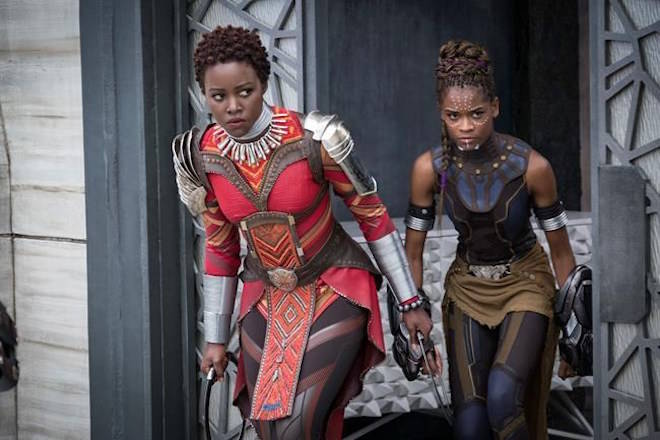 This image released by Disney shows Lupita Nyong’o, left, and Letitia Wright in a scene from Marvel Studios’ “Black Panther.” (Matt Kennedy/Marvel Studios-Disney via AP)