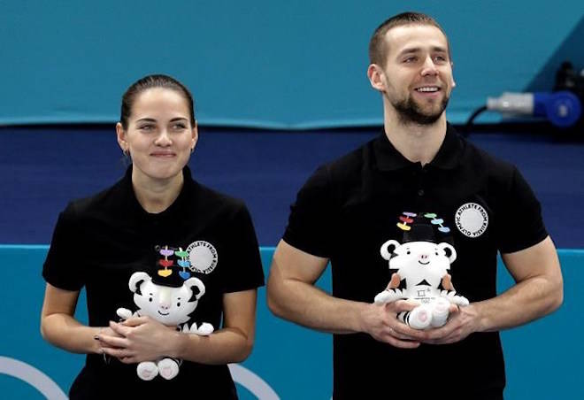 Alexander Krushelnitsky, left, with Anastasia Bryzgalova, has initially been found guilty of doping. The Canadian Press.