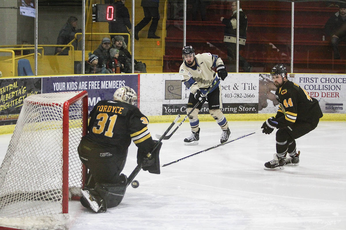 GENERALS HOCKEY - Fort Saskatchewan Chief netminder Devon Fordyce made this stop against the Lacombe Generals on Monday, Feb. 19th. Todd Colin Vaughan/Red Deer Express