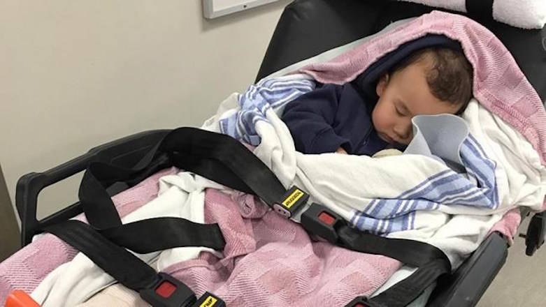 Two-year-old Julian Diaczok is treated after being injured in an escalator accident in Vancouver. Andrea Diaczek says she was holding her two-year-old son’s hand as they went down the escalator at the Vancouver International Airport last Friday.THE CANADIAN PRESS/1130 News-Andrea Diaczok