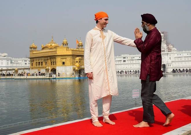 Prime Minister Justin Trudeau and Minister of National Defence Minister Harjit Singh Sajjan visit the Golden Temple in Amritsar, India on Wednesday, Feb. 21, 2018. THE CANADIAN PRESS/Sean Kilpatrick