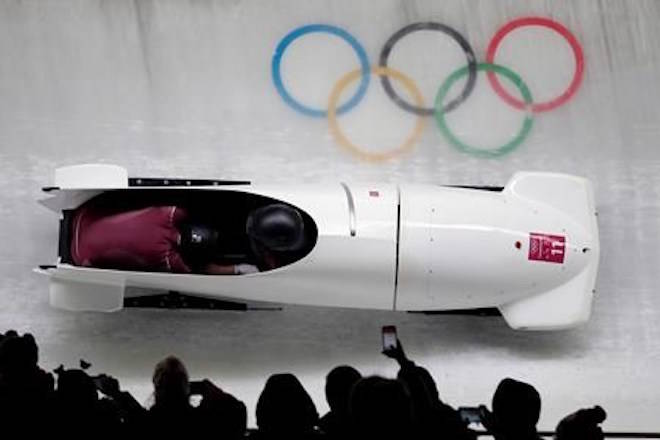 Driver Nadezhda Sergeeva and Anastasia Kocherzhova of the Olympic Athletes of Russia take a curve in their third heat during the women’s two-man bobsled final at the 2018 Winter Olympics in Pyeongchang, South Korea, Wednesday, Feb. 21, 2018. (AP Photo/Michael Sohn)