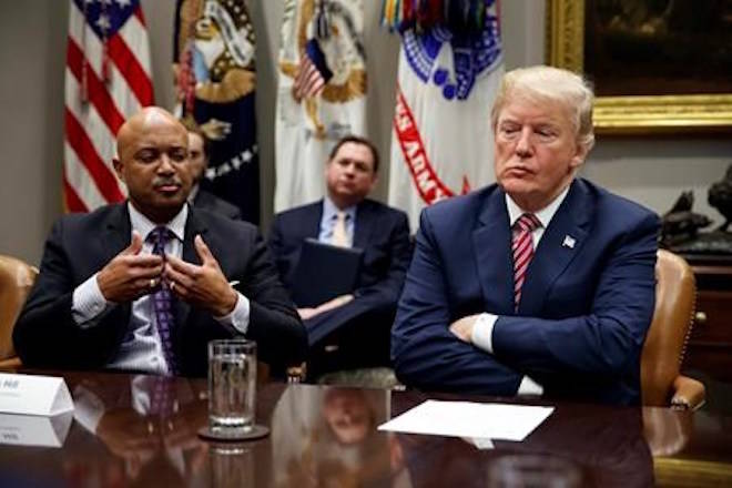 President Donald Trump listens as Indiana Attorney General Curtis Hill speaks during a meeting with state and local officials to discuss school safety in the Roosevelt Room of the White House, Thursday, Feb. 22, 2018, in Washington. (AP Photo/Evan Vucci)