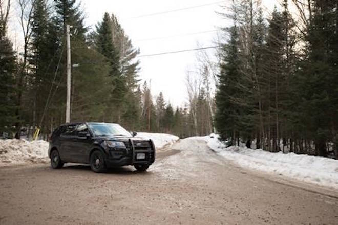 An Ontario Provincial Police cruiser blocks the scene of what police are investigating as a triple murder-suicide about 300 kilometres north of Toronto, in Ryerson Township, Ont., on Sunday, February 25, 2018. Police in a small central Ontario community say they’re investigating the deaths of four people as a triple murder-suicide. Ontario Provincial Police say they believe a man killed two women and another man before killing himself in Ryerson Township, Ont., about 300 kilometres north of Toronto. THE CANADIAN PRESS/Salmaan Farooqui