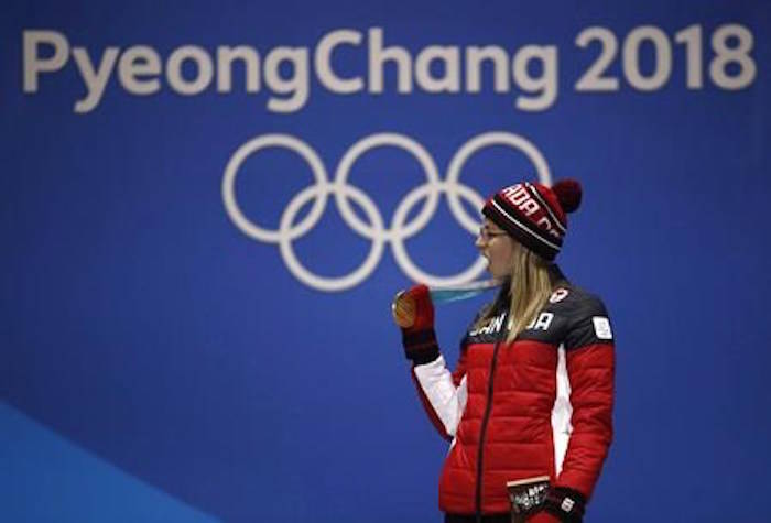 Gold medallist in the women’s halfpipe Cassie Sharpe, of Canada, celebrates during the medals ceremony at the 2018 Winter Olympics in Pyeongchang, South Korea, Tuesday, Feb. 20, 2018. THE CANADIAN PRESS/AP/Charlie Riedel