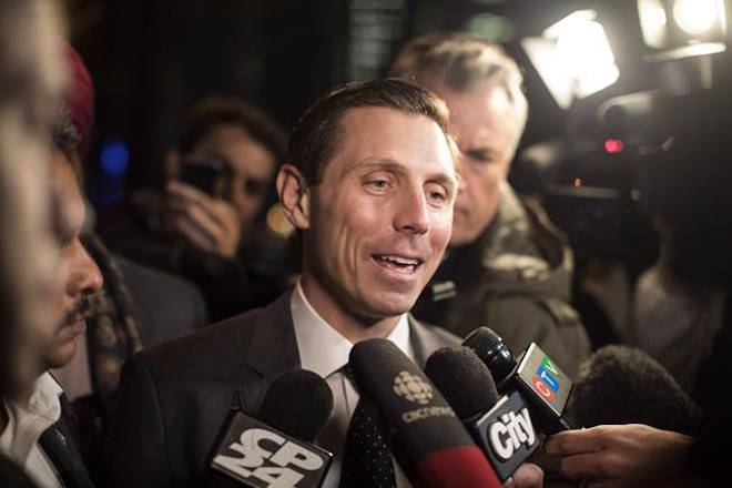 Ontario Conservative leadership candidate Patrick Brown leaves the Ontario PC Party Head Offices in Toronto on Tuesday, February 20, 2018. THE CANADIAN PRESS/Chris Young