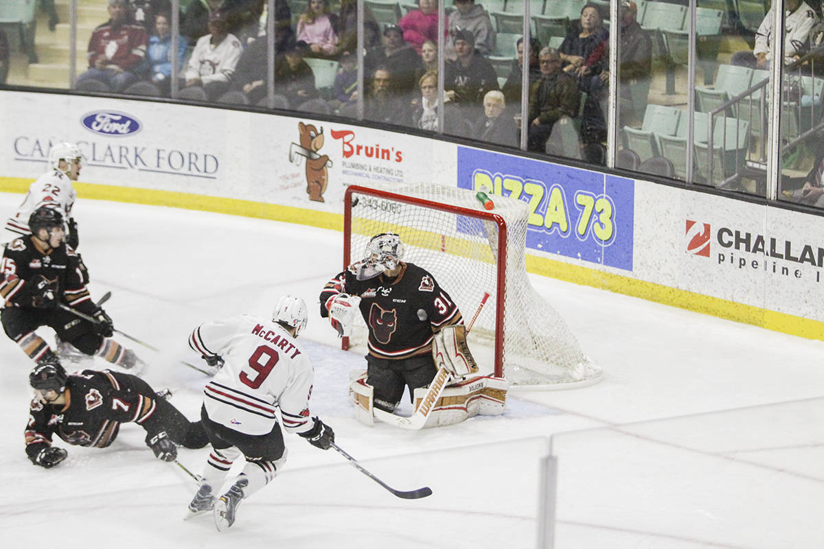 REBELS GOAL - Mason McCarty blasted this roofer past Calgary Hitmen goalie Nick Schneider Wednesday night. Todd Colin Vaughan/Red Deer Express