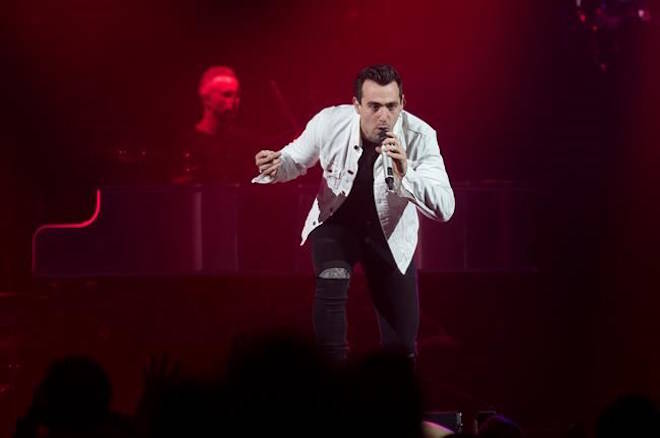 Jacob Hoggard, frontman for the rock group Hedley, performs during the band’s concert in Halifax on Friday, February 23, 2018. THE CANADIAN PRESS/Darren Calabrese
