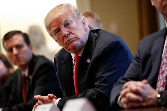 President Donald Trump listens during a meeting with steel and aluminum executives in the Cabinet Room of the White House, Thursday, March 1, 2018, in Washington. Trump’s announcement that he will impose stiff tariffs on imported steel and aluminum has upended political alliances on Capitol Hill. (AP Photo/Evan Vucci)