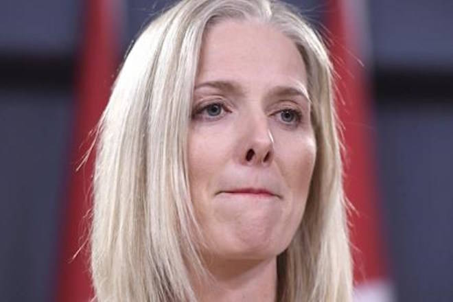 Minister of Environment and Climate Change Catherine McKenna listens to a question during a press conference on the government&rsquo;s environmental and regulatory reviews related to major projects, in the National Press Theatre in Ottawa on Thursday, Feb. 8, 2018. THE CANADIAN PRESS/Justin Tang