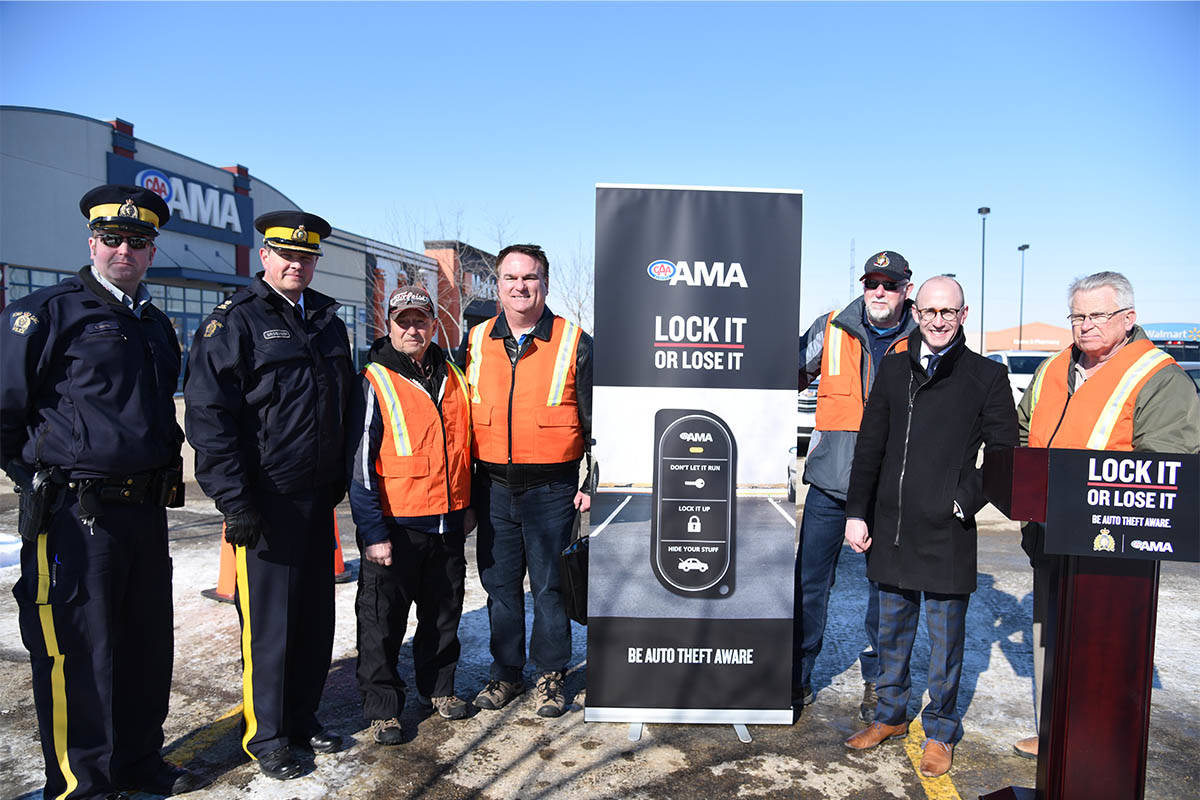 LOCK OR LOSE - Jeff Kasbrick with AMA (second from the right) along with Red Deer RCMP officers and members of the Citizens on Patrol at an event announcing AMA’s partnership with RCMP March 7th. Michelle Falk/Red Deer Express