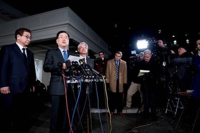 South Korean national security director Chung Eui-yong, center, speaks to reporters at the White House in Washington, Thursday, March 8, 2018, as intelligence chief Suh Hoon, left and Cho Yoon-je, the South Korea ambassador to United States listen. President Donald Trump has accepted an offer of a summit from the North Korean leader and will meet with Kim Jong Un by May, a top South Korean official said in a remarkable turnaround in relations between two historic adversaries. (AP Photo/Andrew Harnik)