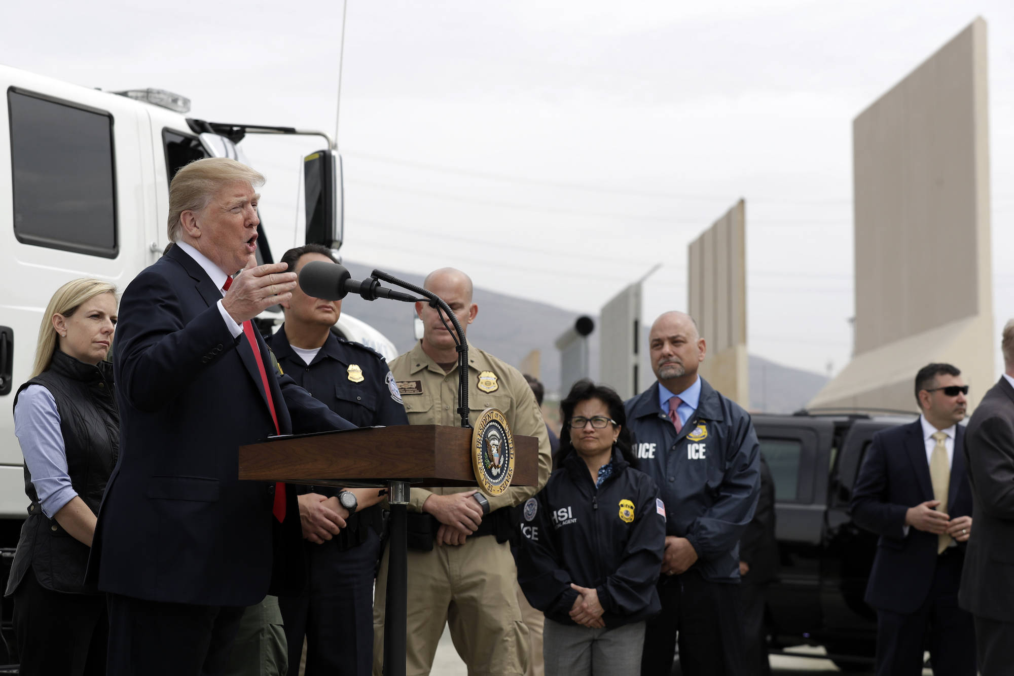 President Donald Trump speaks after reviewing border wall prototypes, Tuesday, March 13, 2018, in San Diego,. (AP Photo/Evan Vucci)
