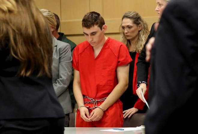 FILE- This Feb. 19, 2018 file photo shows Nikolas Cruz appearing in court for a status hearing before Broward Circuit Judge Elizabeth Scherer in Fort Lauderdale, Fla., Florida prosecutors announced Tuesday, March 13 that they will seek the death penalty against Cruz, a former student charged in the fatal shooting of 17 people at Marjory Stoneman Douglas High School last month. (Mike Stocker/South Florida Sun-Sentinel via AP, Pool, File)