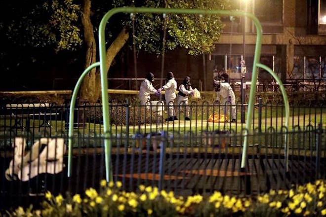 Investigators in protective suits work at the scene near the Maltings shopping centre in Salisbury, England, Tuesday, March 13, 2018. The use of Russian-developed nerve agent Novichok to poison ex-spy Sergei Skripal and his daughter makes it “highly likely” that Russia was involved, British Prime Minister Theresa May said Monday. Novichok refers to a class of nerve agents developed in the Soviet Union near the end of the Cold War.(Andrew Matthews/PA via AP)