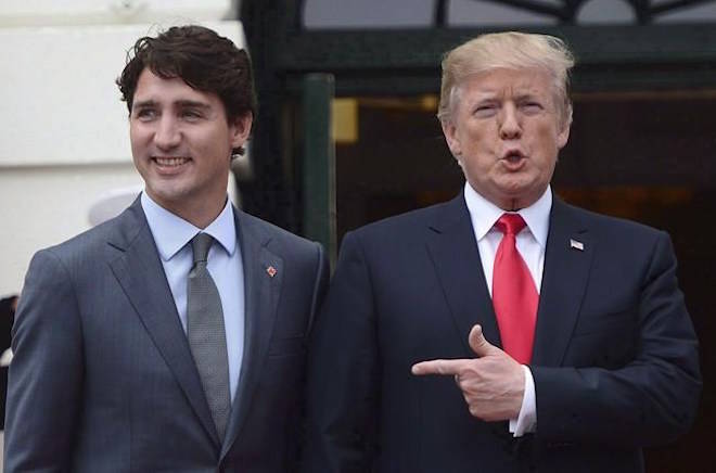 U.S. President Donald Trump, shown with Prime Minister Justin Trudeau at the White House last year, told a fundraiser that after Trudeau told him the U.S. does not have a trade deficit with Canada, he replied, “Wrong, Justin, you do.” The Canadian Press/Jonathan Ernst/Reuters