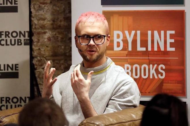 Chris Wylie, from Canada, who once worked for the UK-based political consulting firm Cambridge Analytica, gives a talk at the Frontline Club in London, Tuesday, March 20, 2018. Cambridge Analytica has been accused of improperly using information from more than 50 million Facebook accounts. It denies wrongdoing. Wylie has been quoted as saying the company used the data to build psychological profiles so voters could be targeted with ads and stories. (AP Photo/Matt Dunham)