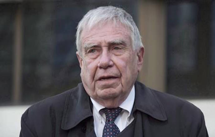 Bruce Carson leaves the courthouse after appearing in court for a verdict in his case, Tuesday, November 17, 2015 in Ottawa. A one-time senior aide to former prime minister Stephen Harper has been found guilty of influence peddling by Canada’s highest court. THE CANADIAN PRESS/Adrian Wyld