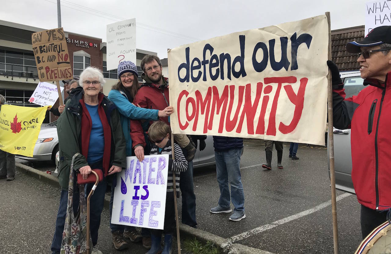 A Defend the Water rally was held against Kinder Morgan’s Trans Mountain pipeline Friday at Chilliwack-Hope MP Mark Strahl���s office to observe A National Day of Action. (Jennifer Feinberg/ The Progress)