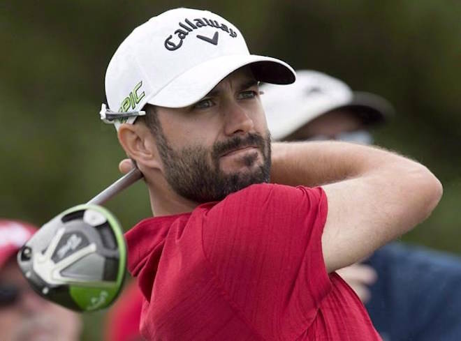 Canada’s Adam Hadwin watches his tee shot on the 17th hole during the second round of the Canadian Open golf tournament at Glen Abbey Golf Club, in Oakville, Ont., Friday, July 28, 2017. With a whirlwind year behind him, Hadwin feels better positioned to take a second shot at the Masters. THE CANADIAN PRESS/Frank Gunn