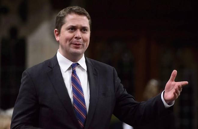 Conservative Leader Andrew Scheer stands during question period ion the House of Commons on Parliament Hill in Ottawa on Wednesday, March 28, 2018. The Opposition Conservatives have opened up a new line of attack on the Liberals in recent days after media reports said the country’s market debt had eclipsed the $1-trillion mark for the first time. THE CANADIAN PRESS/Sean Kilpatrick