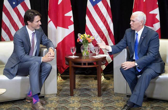 Prime Minister Justin Trudeau meets with American Vice-President Mike Pence at the National Governor’s Association (NGA) Special Session - Collaborating to Create Tomorrow’s Global Economy, in Providence, R.I., Friday, July 14, 2017. (Ryan Remiorz/The Canadian Press)