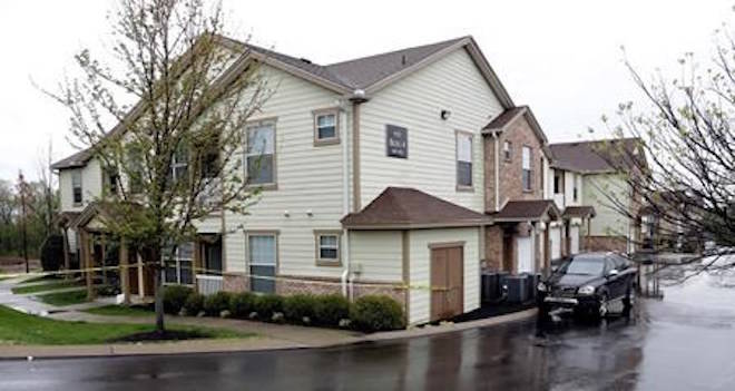 Police tape marks the apartment building reported to be where Travis Reinking lives in Nashville, Tenn., Sunday, April 22, 2018. Police say Reinking is the suspect in a shooting at a Waffle House restaurant Sunday in Nashville that left four people dead. (AP Photo/Mark Humphrey)