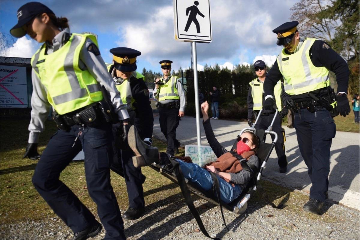 Close to 30 protesters were arrested at a Trans Mountain demonstration in Burnaby. (Rogue Collective photo)