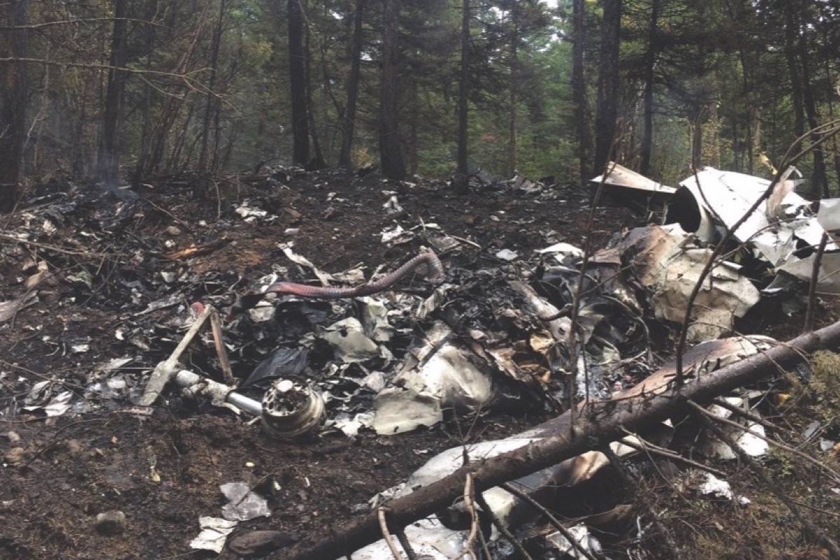 The wreckage of a Cessna Citation which crashed on October 13, 2016, is seen in the woods near Lake Country, B.C., in this October 15, 2016, Transportation Safety Board handout image. The aircraft crashed shortly after takeoff, killing the pilot and all three passengers aboard, including the former Alberta Premier Jim Prentice. THE CANADIAN PRESS/HO-TSB,