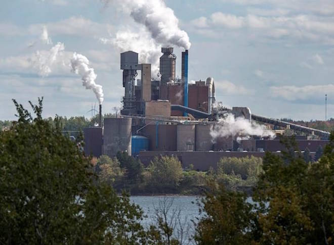 The Northern Pulp Nova Scotia Corporation mill is seen in Abercrombie, N.S. on October 11, 2017. An Environment Canada analysis says the federal government’s carbon pricing plan will eliminate as much as 90 million tonnes of carbon dioxide by 2022. That is the equivalent to taking more than 20 million cars off the road and accounts for about 12 per cent of the total amount of what Canada emitted in 2016. THE CANADIAN PRESS/Andrew Vaughan