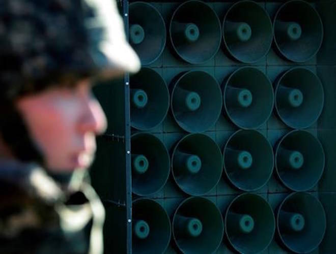 FILE - In this Friday, Jan. 8, 2016 file photo, a South Korean army soldier stands near the loudspeakers near the border area between South Korea and North Korea in Yeoncheon, South Korea. (Lim Tae-hoon/Newsis via AP, File)