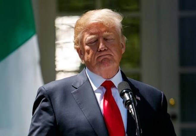 President Donald Trump pauses during a during a news conference with Nigerian President Muhammadu Buhari in the Rose Garden of the White House in Washington, Monday, April 30, 2018.(AP Photo/Carolyn Kaster)