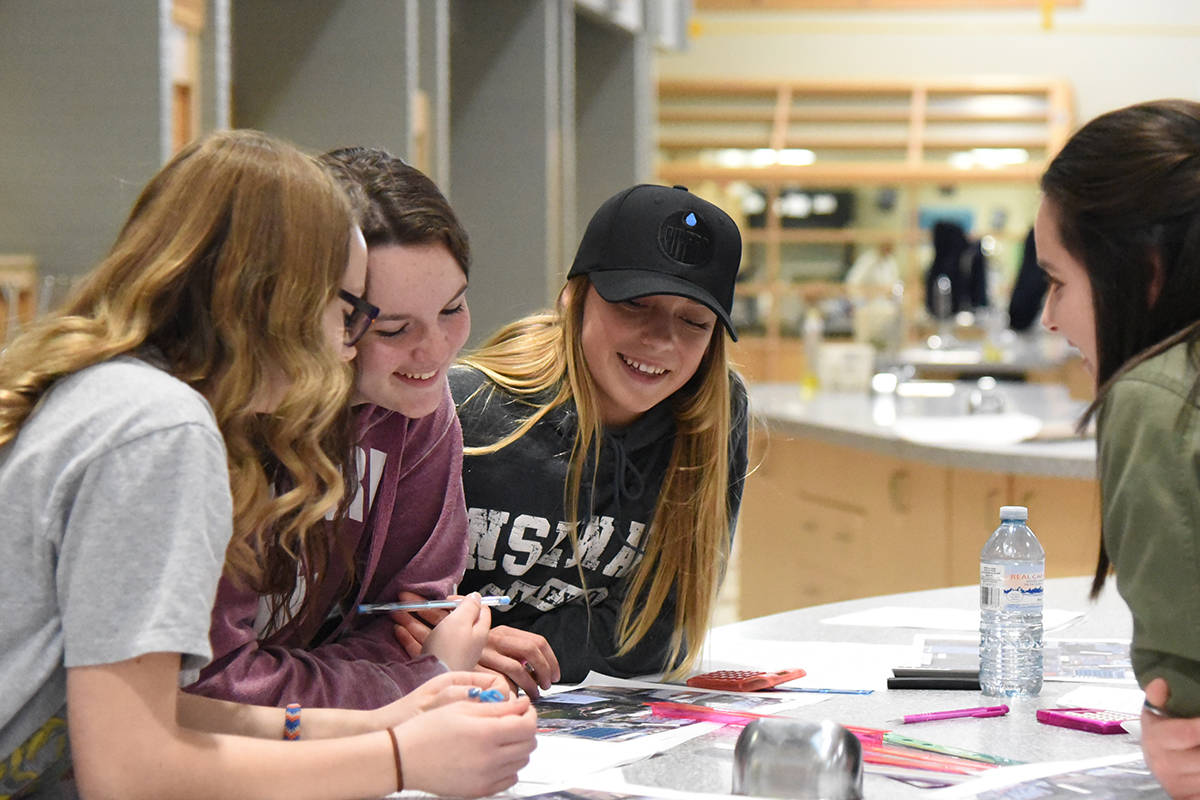 ENGINEERING WORKSHOP - Kyah Poitra (center) from Lindsay Thurber High School, works on a design project at the Manerva Conference with other Grade 9 girls from around Red Deer, May 2nd.                                Michelle Falk/Red Deer Express