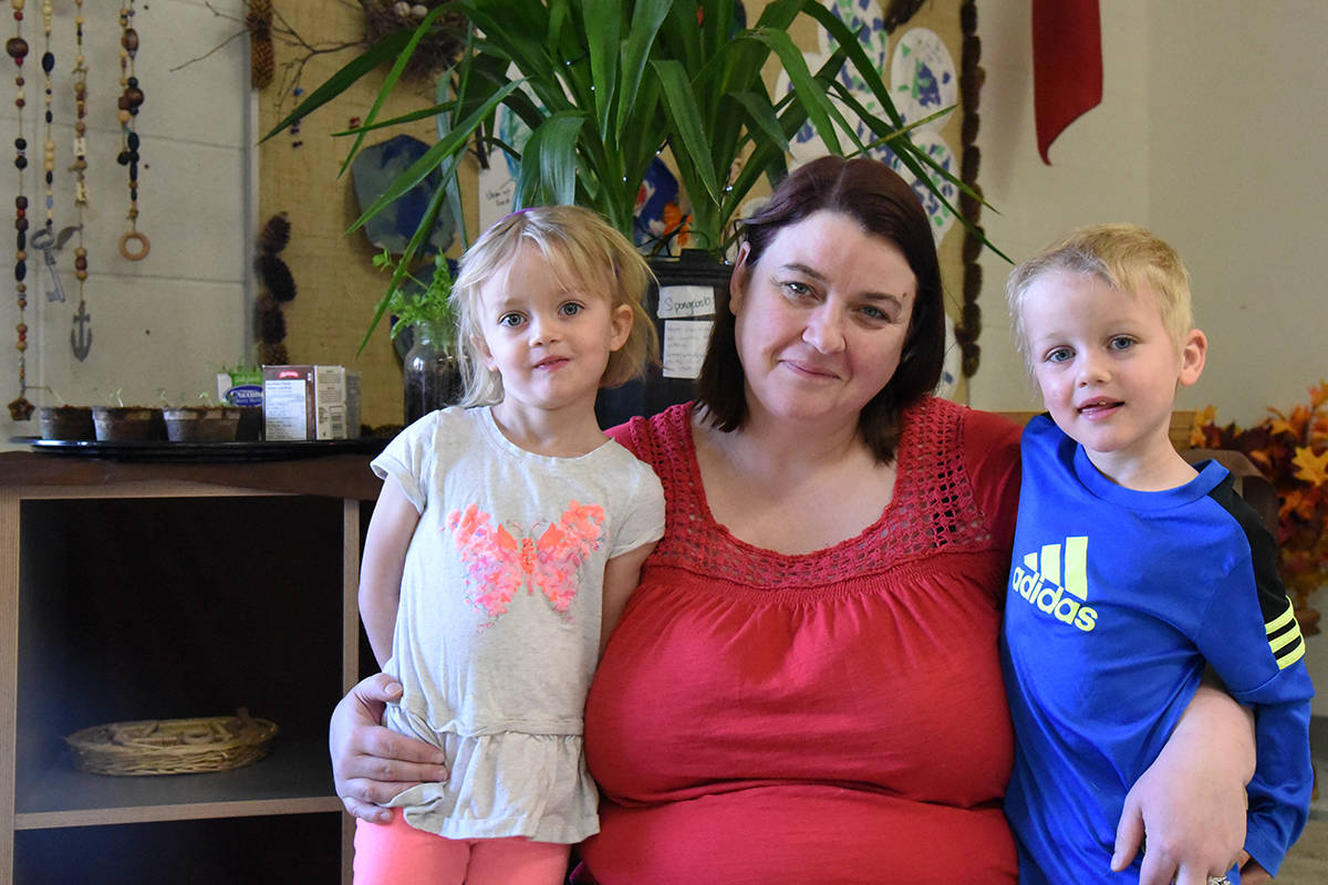 TWICE AS NICE - Piper and Grady Johnson with their mom Leanne in a classroom at Pines Day Care.                                Michelle Falk/Red Deer Express