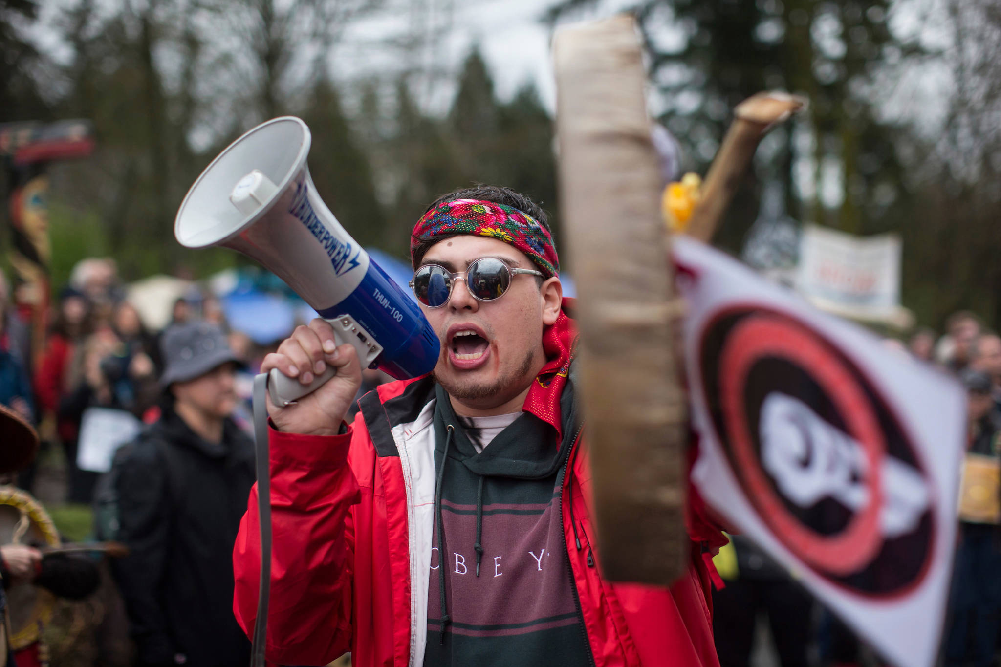 Cedar George-Parker addresses a crowd of protesters opposed to Kinder Morgan’s plan on the Trans Mountain pipeline extension on April 7 in Burnaby, B.C. (Darryl Dyck/The Canadian Press via AP)