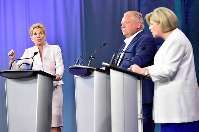 Ontario Liberal Leader Kathleen Wynne, left to right, Ontario Progressive Conservative Leader Doug Ford and Ontario NDP Leader Andrea Horwath participate during the third and final televised debate of the provincial election campaign in Toronto, Sunday, May 27, 2018. THE CANADIAN PRESS/Frank Gunn