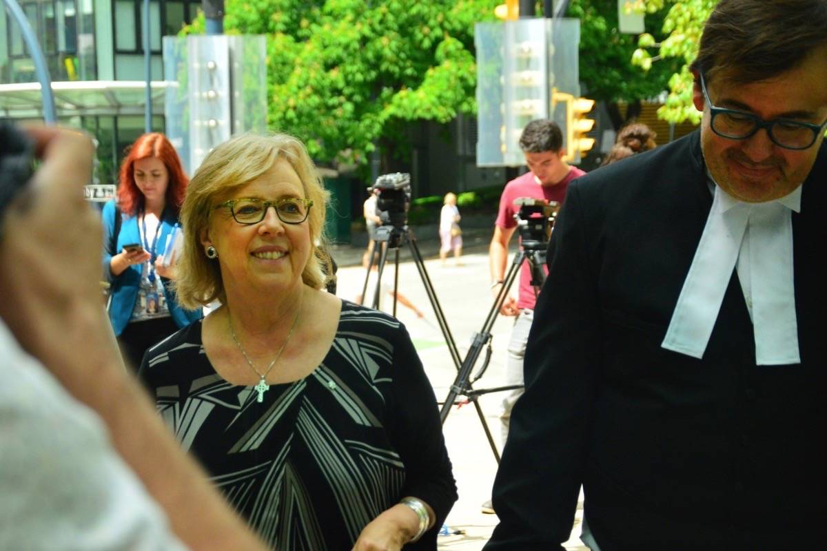 Green Party of Canada Leader Elizabeth May is all smiles after after being found guilty of criminal contempt at B.C. Supreme Court in Vancouver Monday. (Katya Slepian/Black Press)