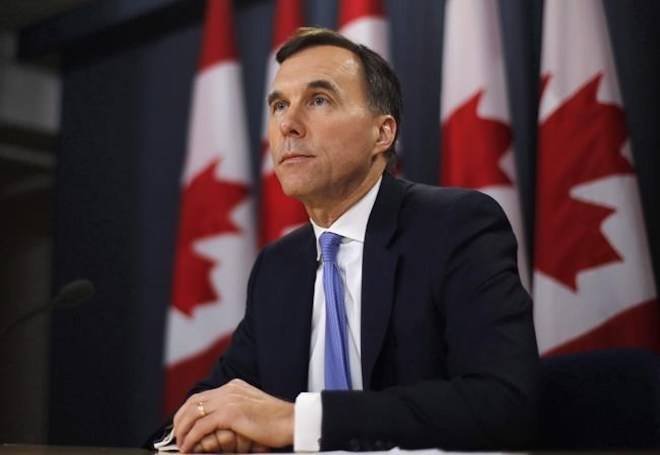 Finance Minister Bill Morneau speaks about the Trans Mountain Expansion project at a press conference in Ottawa on May 16, 2018. THE CANADIAN PRESS/Patrick Doyle