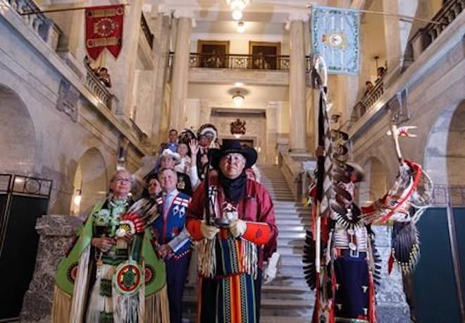 A procession makes its way through the Alberta Legislature before Alberta Premier Rachel Notley apologizes to survivors and families of the Sixties Scoop in Edmonton on Monday May 28, 2018.THE CANADIAN PRESS/Jason Franson