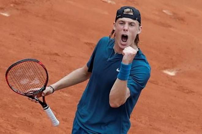 Canada’s Denis Shapovalov celebrates winning against John Millman of Australia during their first round match of the French Open tennis tournament at the Roland Garros stadium in Paris, France, Tuesday, May 29, 2018. (AP Photo/Alessandra Tarantino)
