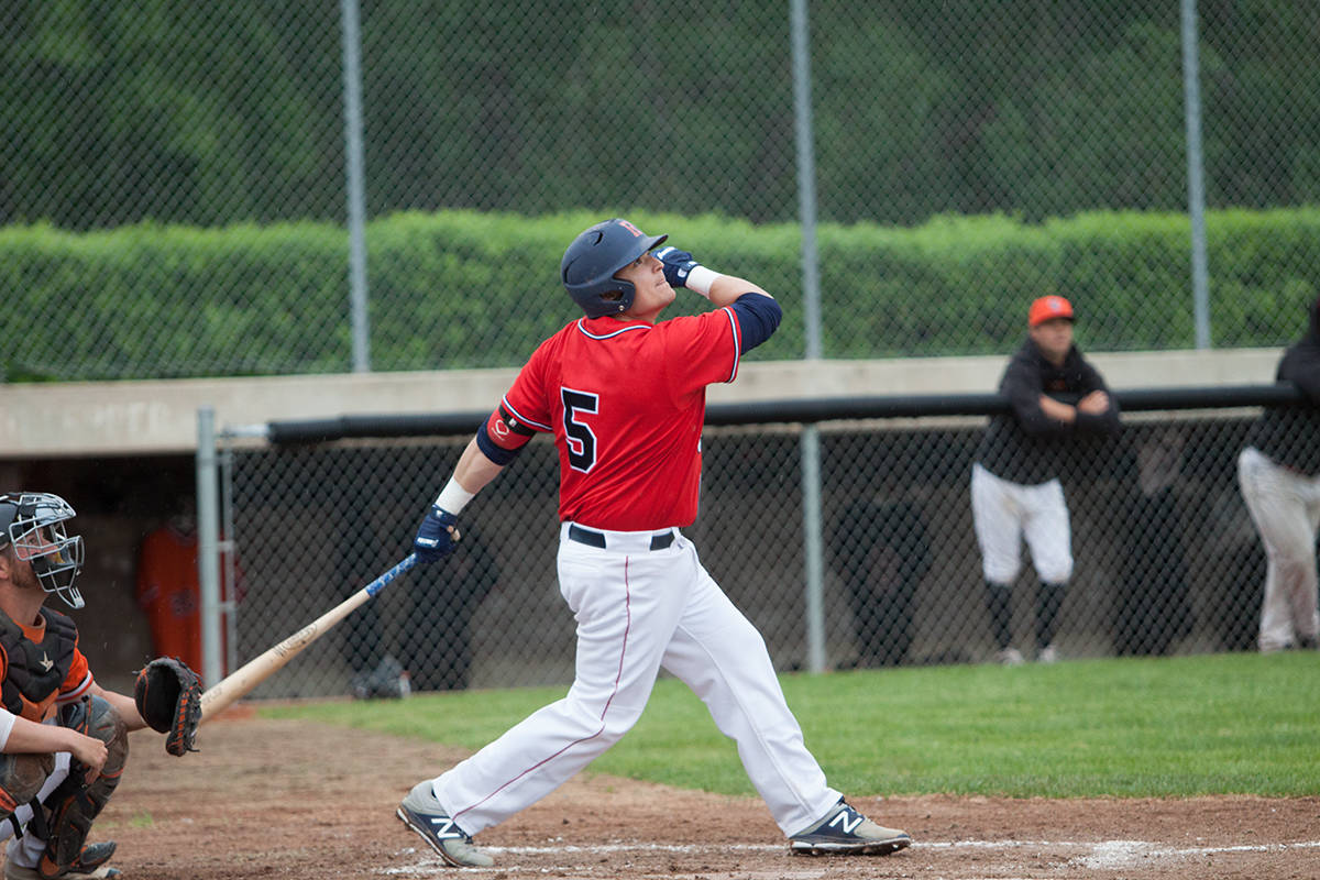RIGGERS WIN - Red Deer Rigger Jason Louis would score on this deep base hit early in the first inning of their game against the St. Albert Tigers on May 30th. Todd Colin Vaughan/Red Deer Express