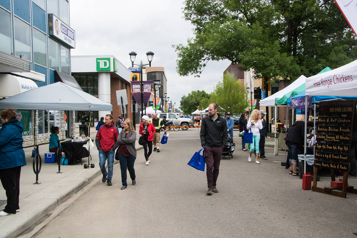 DOWNTOWN MARKET - Hundreds came out for the first ATB Financial Downtown Market of the Summer. Todd Colin Vaughan/Red Deer Express