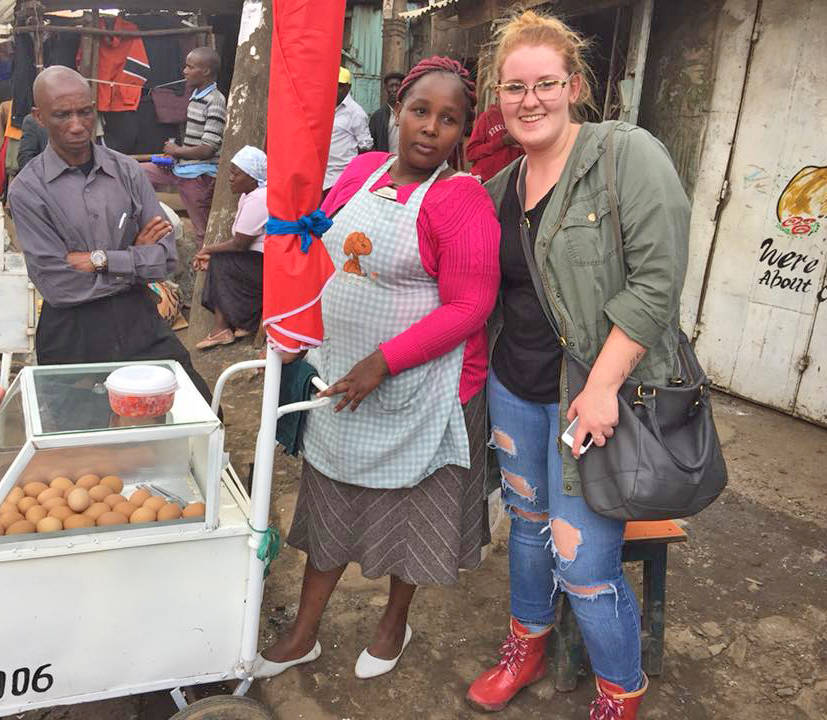 FOOD PROJECT - Lynzee Berreth with one of the lady’s in Africa with a food cart, one of the projects Home of Hope is involved with. photo submitted